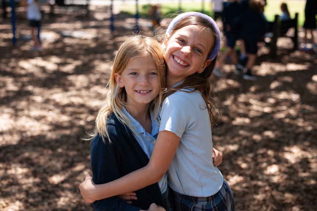 hugging friends